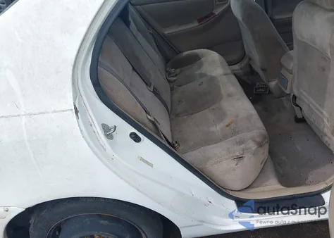 2004 Toyota Corolla Le из США, поврежденный, VIN 2T1BR32E64C287414